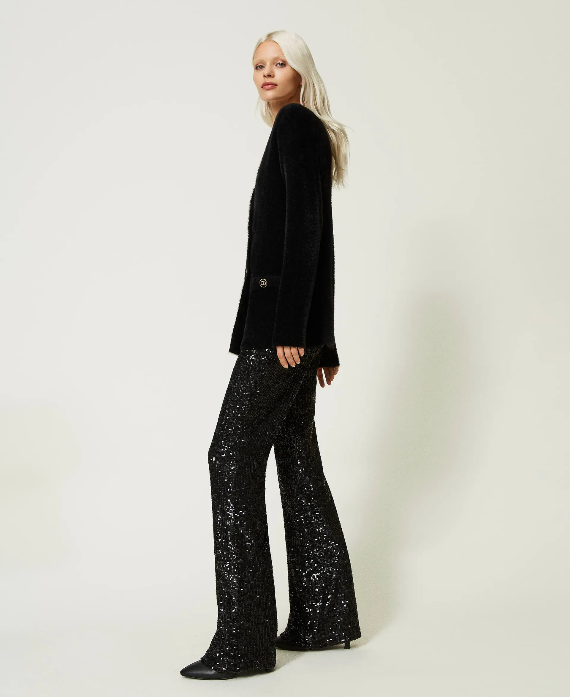 Pantalon évasé en tulle entièrement orné de sequins