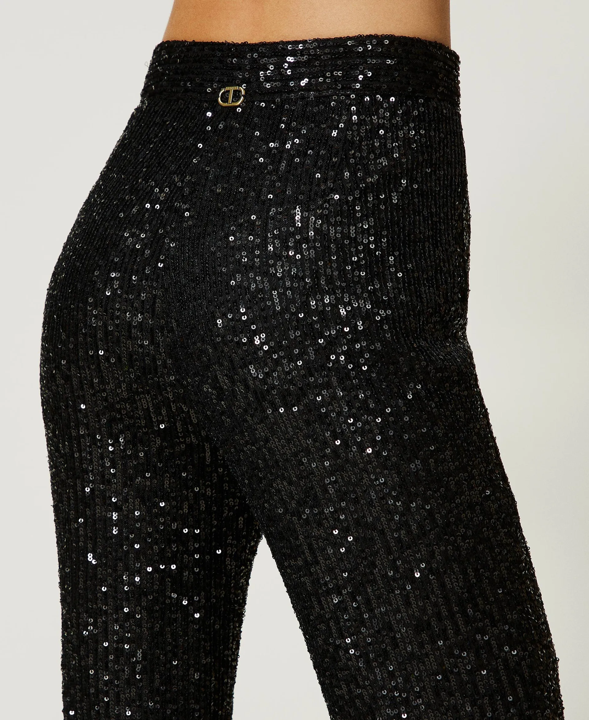 Pantalon évasé en tulle entièrement orné de sequins